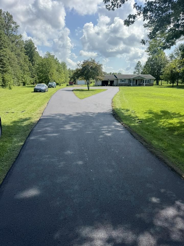 Paved residential driveway on a rural Indiana property
