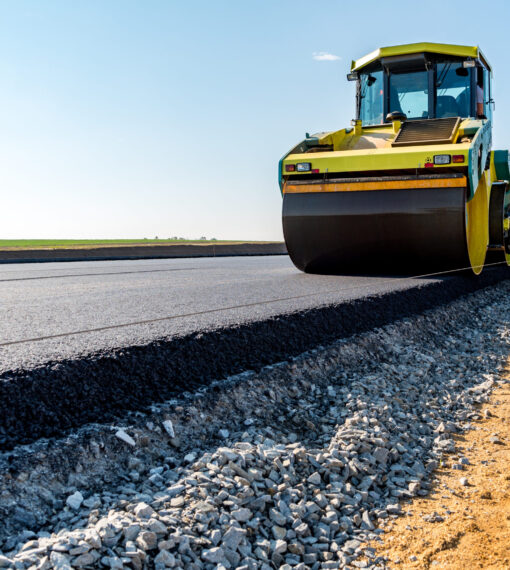 Road rollers building the new asphalt road